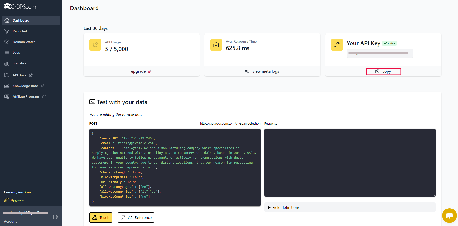 OOPSpam dashboard showing API usage, response time, active API key, and a test section for spam detection data with sample code.