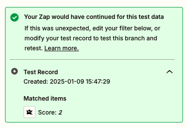 Zapier test confirmation showing a matched test record with a score of 2.